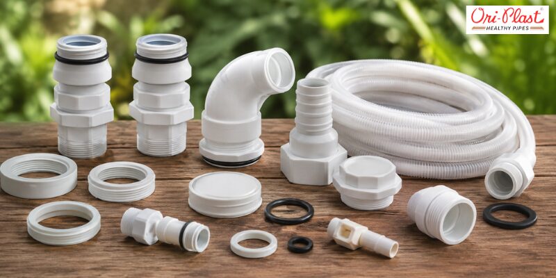 Array of durable PVC pipe fittings, elbows, adapters, and rubber gaskets used for long-term water tank overflow causes and fixes.